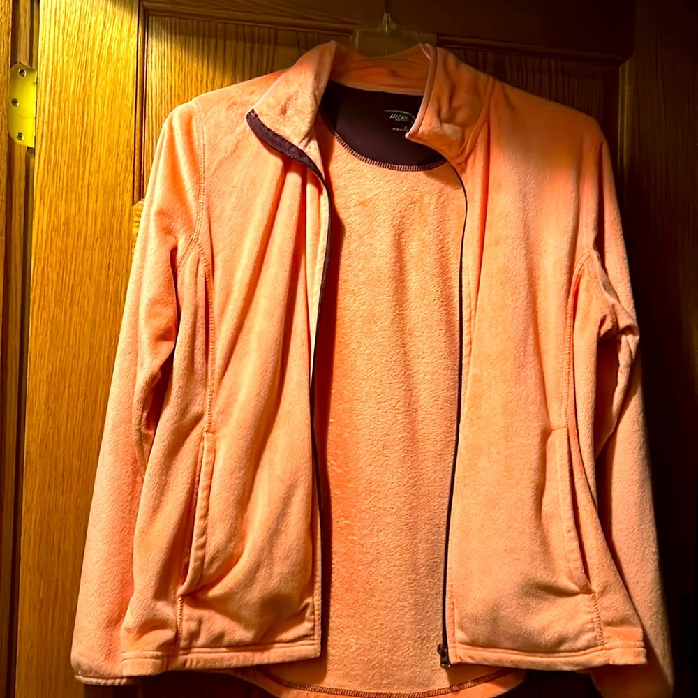 Soft comfortable jacket. Peach with Burgundy trim. Great for layering!